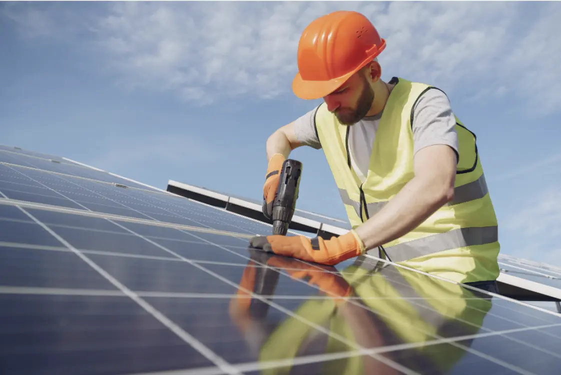 A technician are maintenance solar panels.